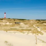 Der Strand und Leuchtturm der Insel Amrum.