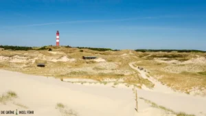 Der Strand und Leuchtturm der Insel Amrum.